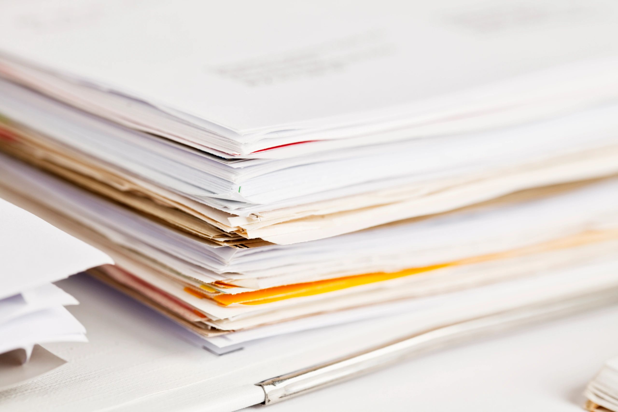 Stack of paperwork in a binder